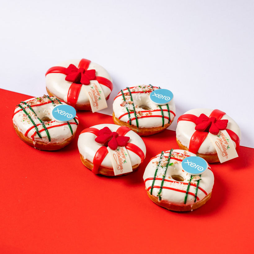 Confezione regalo aziendale "Buone Feste" con logo (vegan)